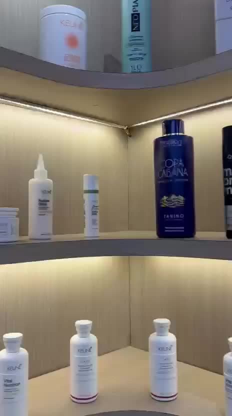 Illuminated hair-care shelves inside IPSA
