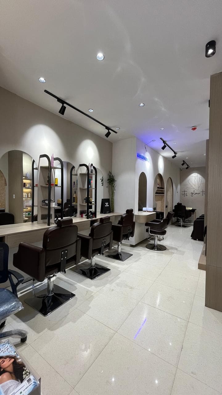 Hair styling chairs and mirrors inside IPSA Beauty Lounge